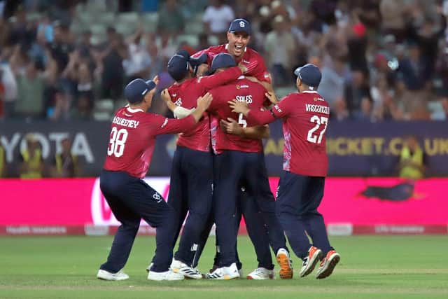 Ben Sanderson is mobbed after claiming the match-winning wicket (Picture: Peter Short)
