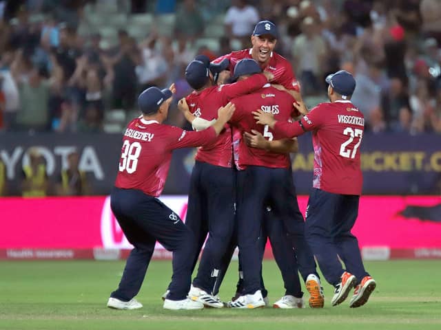 Ben Sanderson is mobbed after claiming the match-winning wicket (Picture: Peter Short)