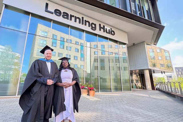 Kieran Coulson and Patricia  Agboka 'gowned up' at Waterside Campus.