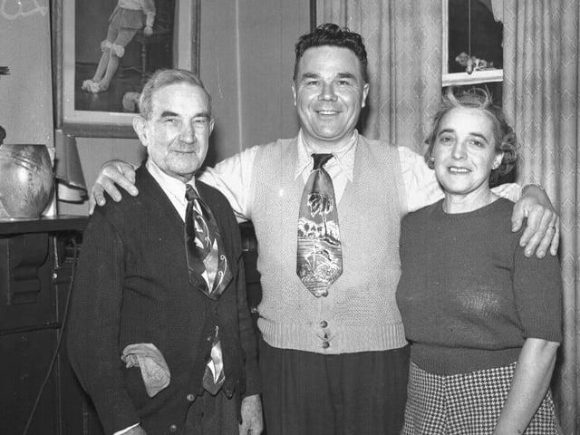 Two men with very loud ties