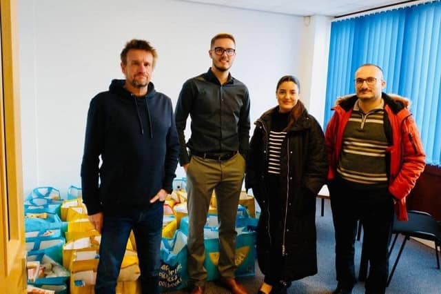 Bhangals Construction Consultants team hand over the hampers to SCCYC