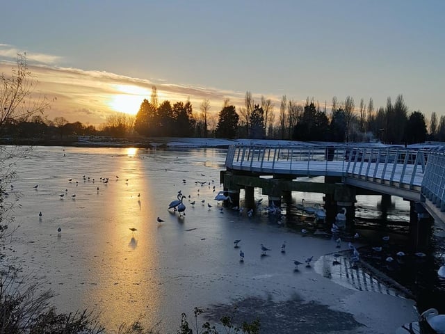 A stunning sunrise over a frozen lake in Billing.