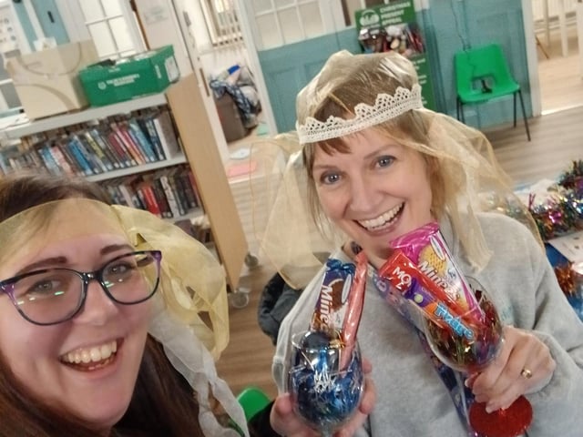 Librarian Shelley and Community Development Worker Rhiann getting into the Festive Spirit at Hand Made Holidays