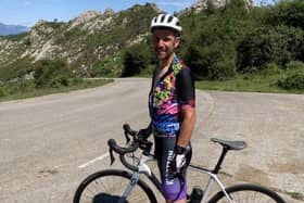 Chris cycling in Spain in 2021.