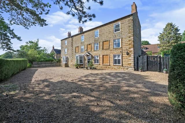 This traditional home is one of the most expensive on the market in the county right now.