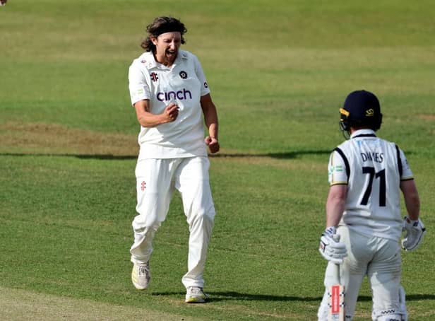 Jack White celebrates claiming the wicket of Alex Davies