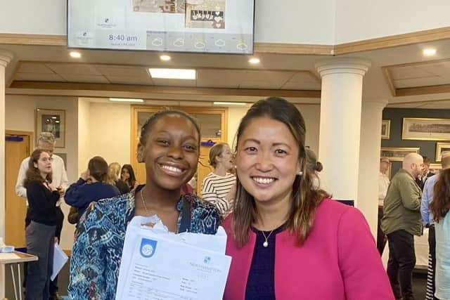  Head Girl Chelsea celebrates a fantastic set of results (A*, A, A) with Head, Dr May Lee