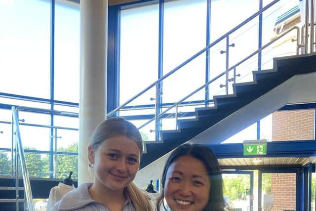 Head Girl, Amy, celebrates with Dr Lee after receiving confirmation to study Medicine at Birmingham