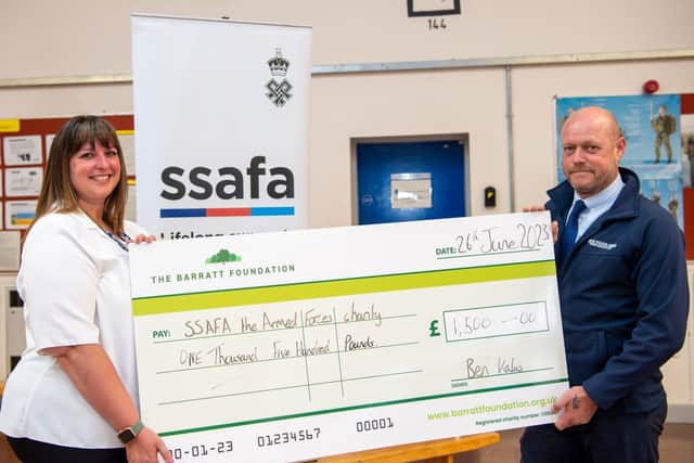 DWSM - SGB-1042 - Gayle from SSAFA receiving her cheque from Dean from David Wilson Homes