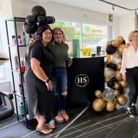 Family hairdressing team celebrates one year since village location takeover after 18 years in former spot