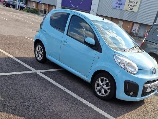 'Little car, big parking attitude.'