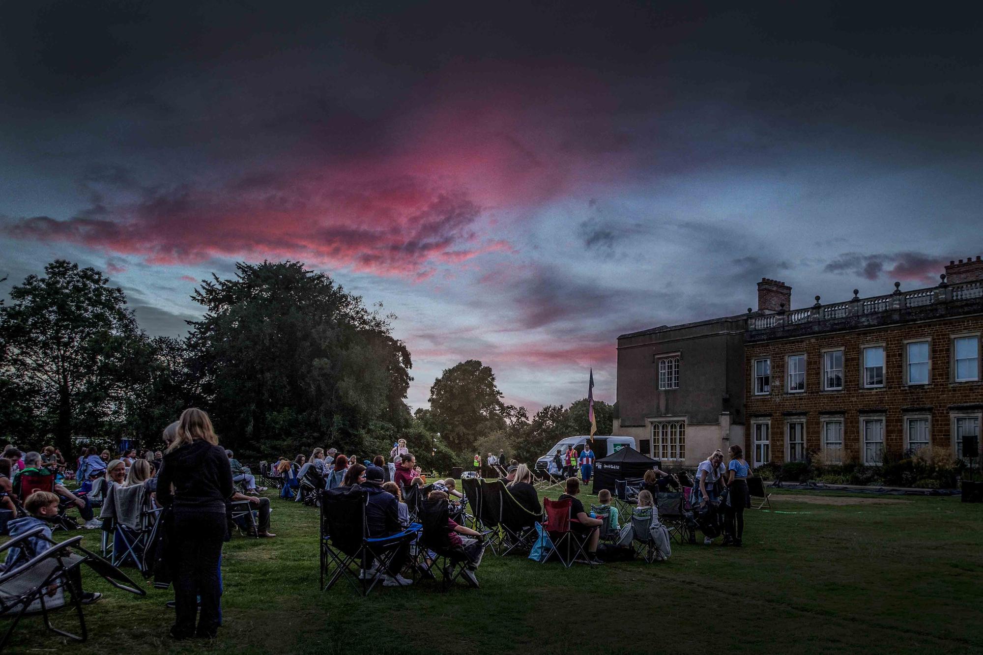 Crowds gathered in the grounds of Delapre Abbey to watch The Greatest Showman on an outdoor screen on Sunday (August 4).