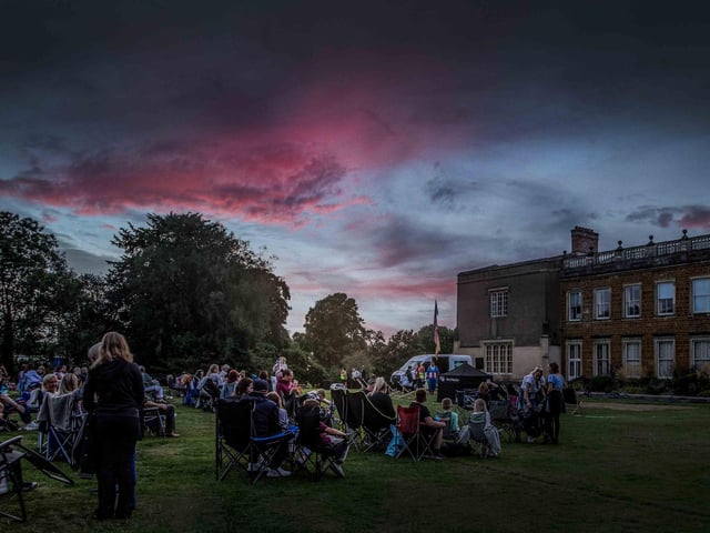 Crowds gathered in the grounds of Delapre Abbey to watch The Greatest Showman on an outdoor screen on Sunday (August 4).
