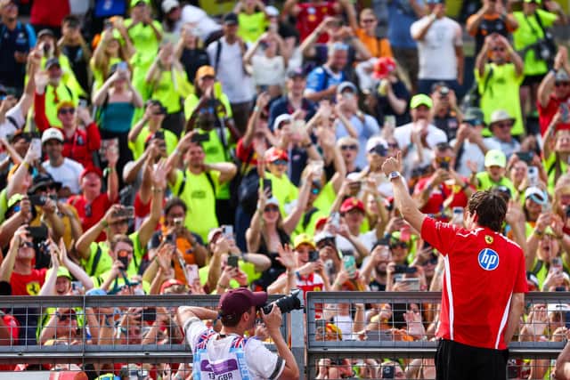 I made the bottom left of this picture (holding the black and orange phone) as Charles Leclerc climbed the barriers to celebrate his win. (Photo by Peter Fox/Getty Images)