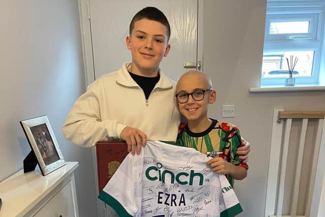 13-year-old Logan Sothcott and 10-year-old Ezra, who was diagnosed with a rare and aggressive form of leukaemia at the end of last year.