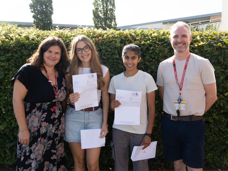 Assistant Principal Miss Cambio and KS5 Director Mr Cole, pictured with Head Students Maia and Rohini at Caroline Chisholm School