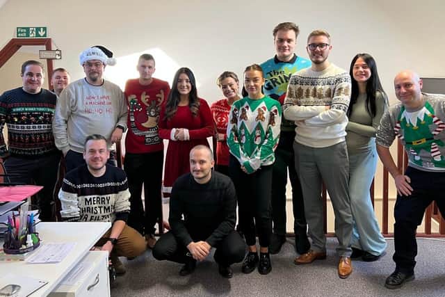 The Bhangals team celebrating the end of the year with Christmas jumper day