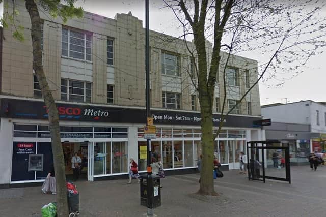 A plan to use Northampton’s former Woolworths store for three shops and 30 apartments has been approved by councillors.