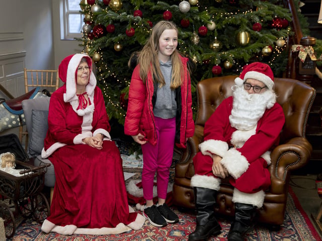 Children meet Father Christmas at Delapre Abbey in December 2022.