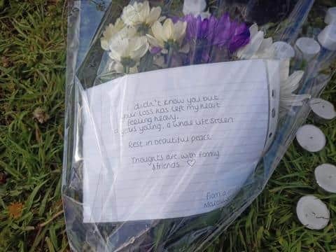 More tributes have been laid next to where the young man was killed in New South Bridge Road on Sunday night (April 23)