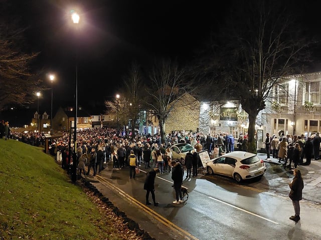 Earls Barton celebrates Christmas Eve in the Square - People flooded the village up to The Old Swan