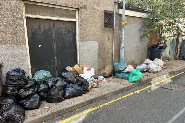 Chapel Place is a 'public health hazard', according to comic book shop owner Jeff Chahal