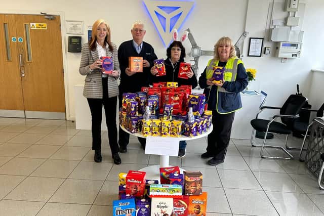 Jeanette Walsh (centre) collects Easter chocolate donations/Jeanette Walsh