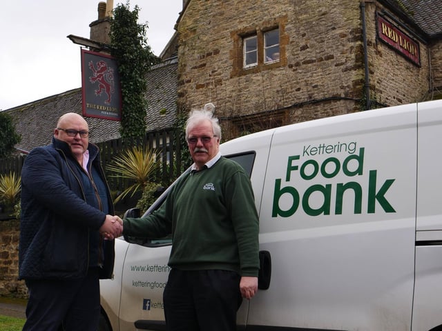 Richard Gordon of Greedy Gordons with Kettering Foodbank volunteer driver Ken Ansdell.