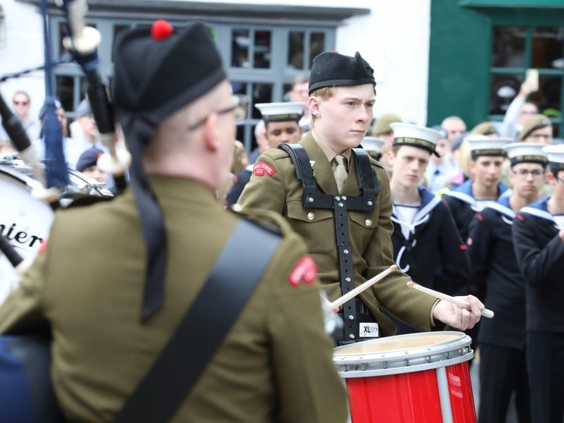 Kettering town centre: crowds line town centre to welcome The Royal Anglian Regiment for Armed Forces Day parade /National World