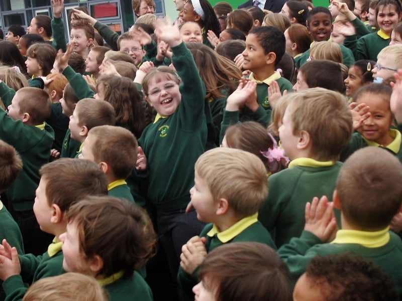 Green Oaks Primary School, Kingsthorpe celebrate the opening of their new school with balloon release.