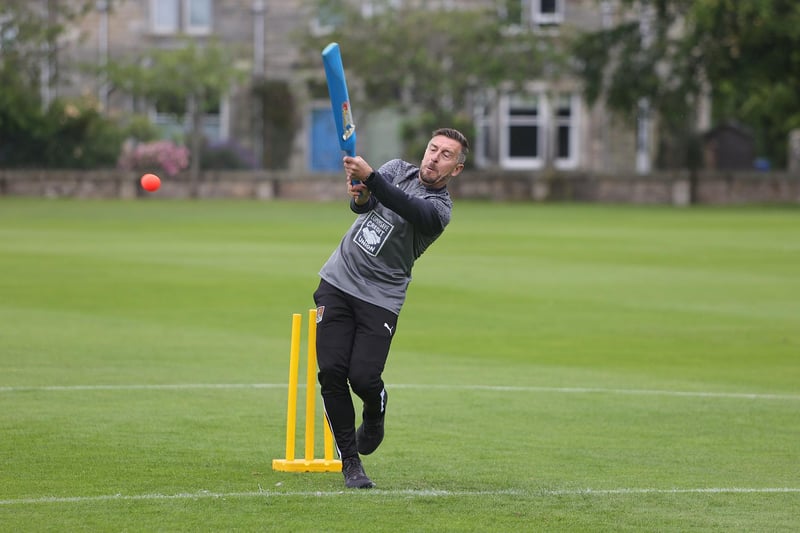 No doubt it was Aussie boss Jon Brady who suggested a game of cricket...
