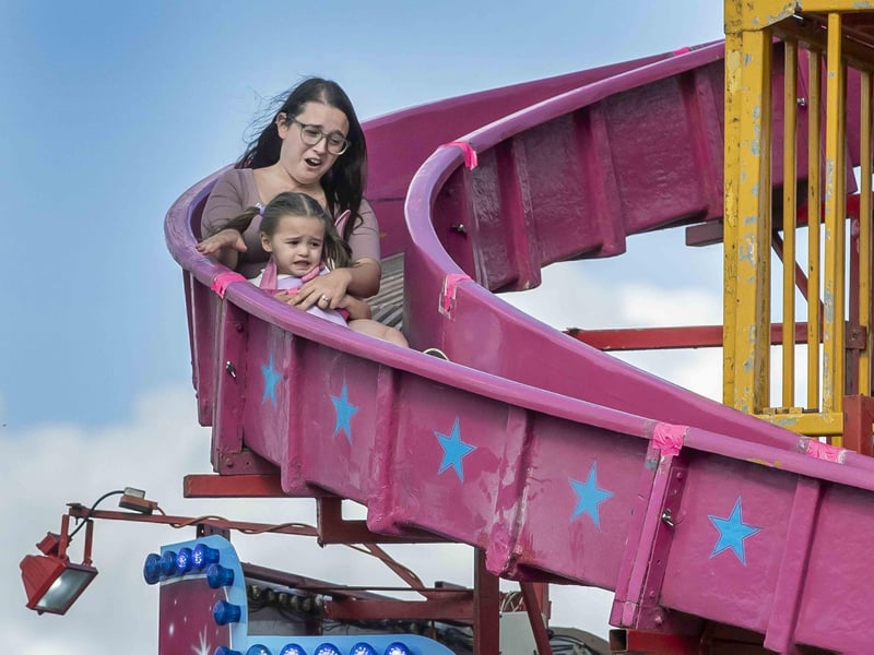 Fun on a fairground ride at the Northampton Balloon Festival 2023.