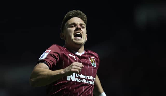 Sam Hoskins celebrates his second goal for the Cobblers against Leyton Orient, a strike that took up to 10th place in the club's all-time scorers' list. Hoskins now has 83 Town goals to his name (Photo by Pete Norton/Getty Images)