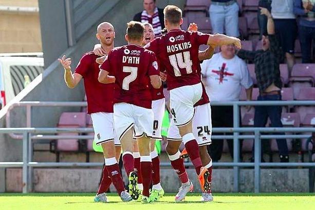 Hoskins' first league goal was a crucial one as he headed in the winner for 10-man Cobblers against Oxford United.