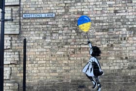 The carefree girl and balloon can be seen on Whitton Lane in Towcester