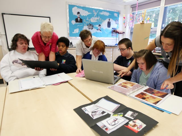 Greenfield School of sports college has won an arts mark and a £300,000 contract to provide alternative forms of education.Teachers pictured with pupils (L-r) Lesley Page, Lucy Carr and Claire Frogley.