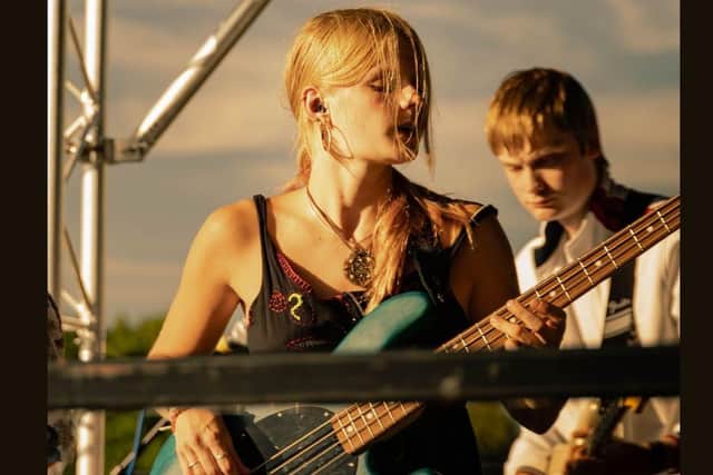 Liv West performing with Tiebreak