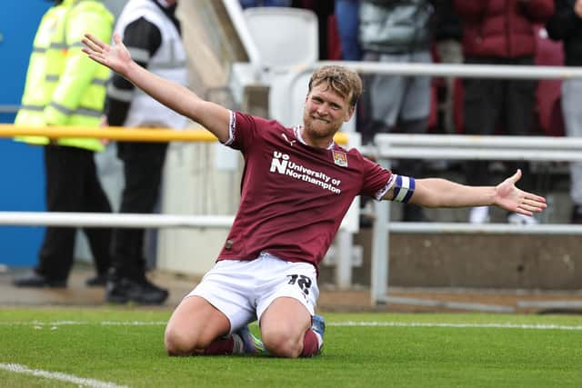 Cameron McGeehan celebrates his goal in the Cobblers' 4-1 win over Shrewsbury Town at Sixfields (Picture: Pete Norton)