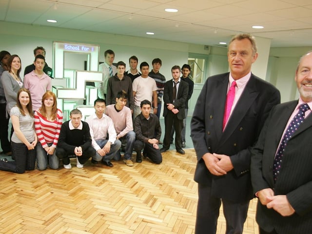 Sixth formers at Northampton School for boys with Head Mike Griffiths and Mark Lee.