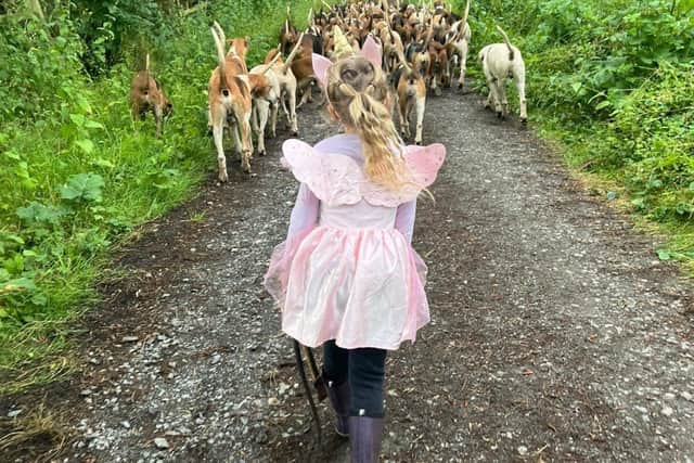 Grace Willis Thrift with the hounds from the Grafton Hunt