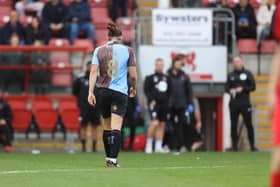 Ben Fox walks off after seeing red.