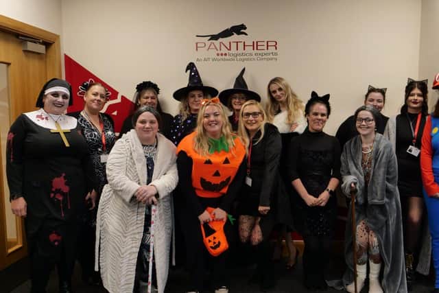 Panther Logistics team members get into the Halloween spirit to raise money for charity