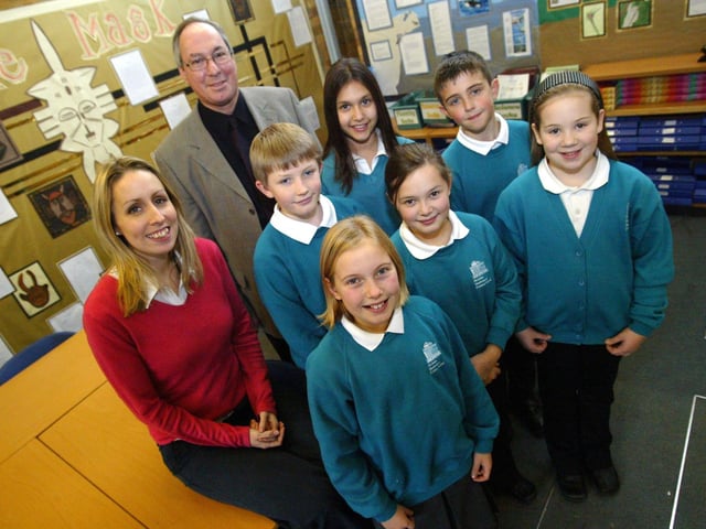 Nicholas Hawksmoor Primary School, Towcester. Richard Edwards (Head teacher) and Miss Louise Jeffery (Year 6 teacher) with some Year 6 pupils