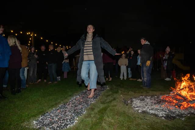 Alex Swindell doing the fire walk