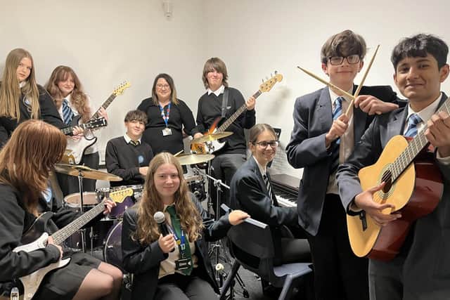 The NIA band celebrates achieving the Music Mark accreditation