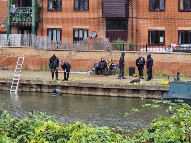 Pictures from day four of a murder probe by the River Nene near Beckets Park, where a man was found dead on a bench early Friday morning (August 1). Northamptonshire Police divers were searching the water on Monday morning (August 4) and are appealing for witnesses.