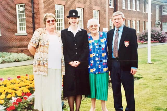 Helen with her parents and her grandmother at her 'passing out' ceremony 24 years ago