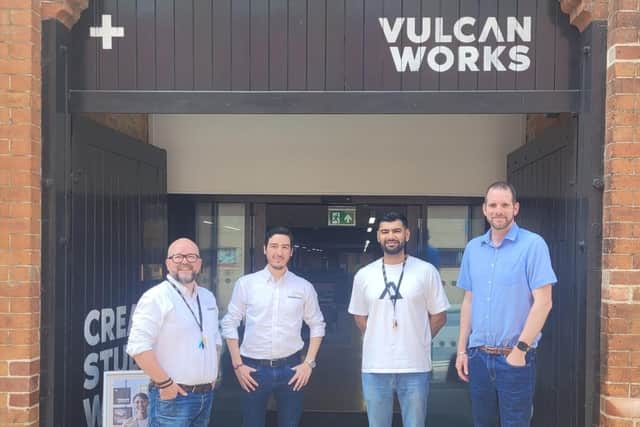 The Hai Robotics and Vulcan Works teams outside Vulcan Works