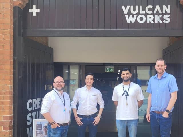 The Hai Robotics and Vulcan Works teams outside Vulcan Works