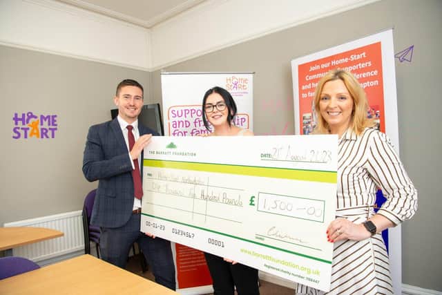 BN - SGB-8621 Matt and Mollie from Barratt Homes presenting a cheque to Zoe Reynolds
